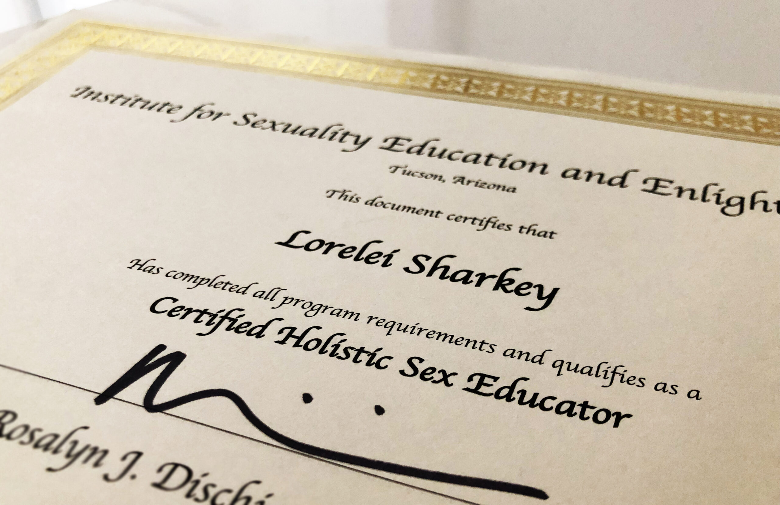 Image of Lo's hard-copy certificate deeming her a Certified Sex Educator